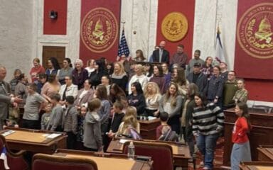 a crowd of WVVA students pose for a phoot at the WV capitol
