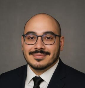 Smiling photo of teacher Joshua Moore
