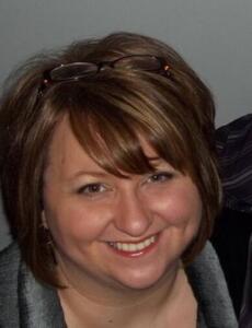 Smiling photo of teacher Sunny Enoch.